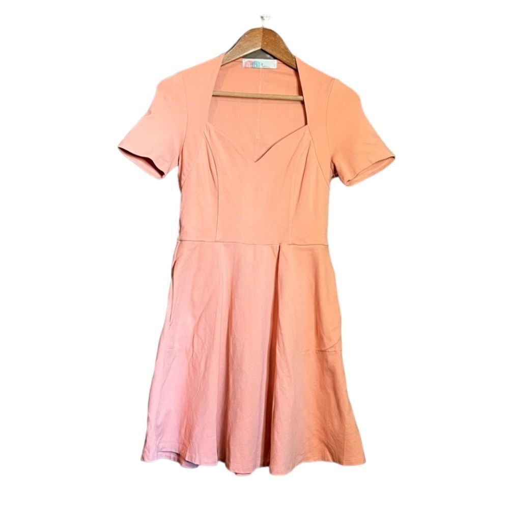 Free people beach short‎ sleeve dress with pockets. Size medium